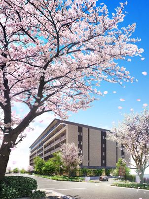 桜が咲く施設の外観