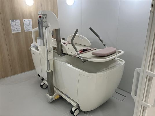 洗濯機が並ぶ部屋