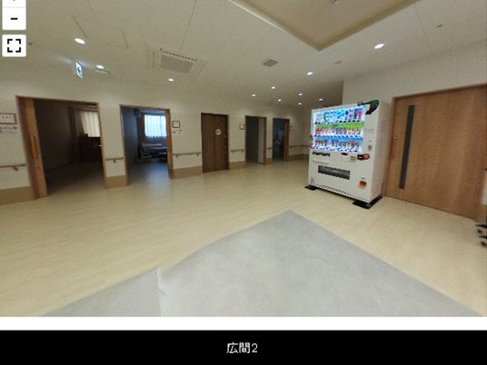広い廊下に自販機がある廊下  