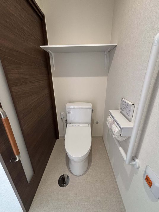 優しい色調のトイレ