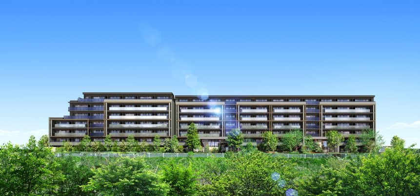緑に囲まれた建物外観