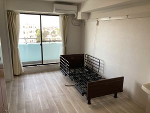 シングルベッドのある居室