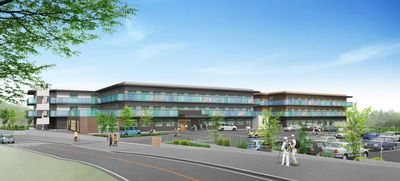 車が停まる建物外観