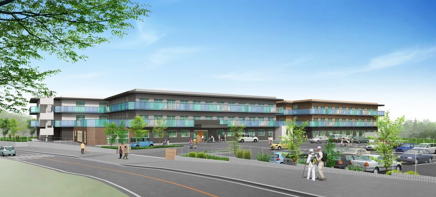 車が停まる建物外観