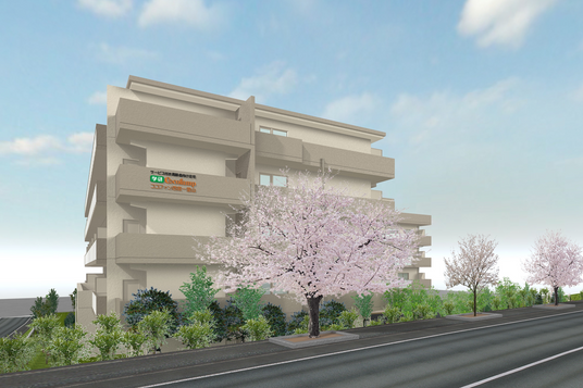 桜の木がある建物外観