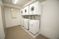 洗濯機が並ぶ部屋