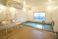 サムネイル 施設の写真 壁に手すりが取り付けられ、バリアフリー化されている浴室