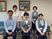 笑顔の職員が並ぶ休憩室  