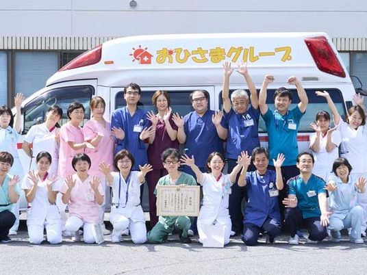 送迎車前の職員集合