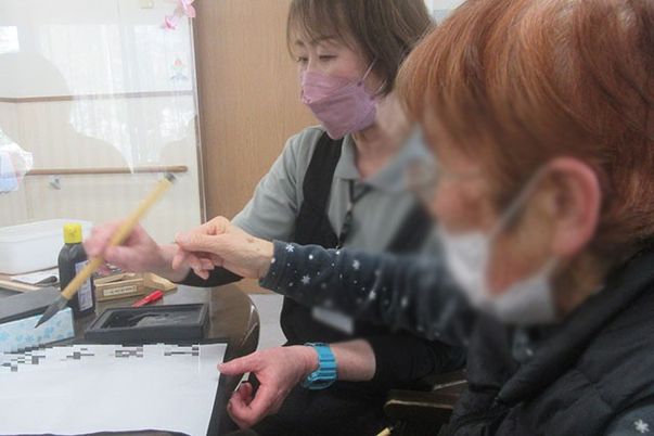 指導するスタッフの様子