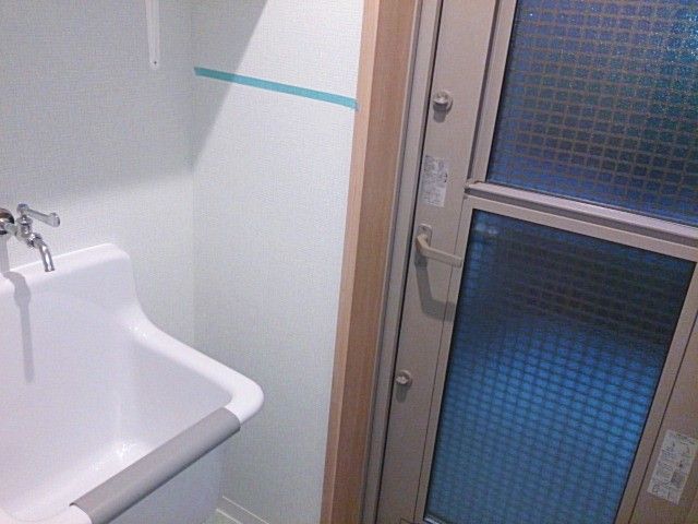 洗面台のある空間 洗面台 落ち着いた照明が特徴の洗面台です。シンプルなデザインで使いやすさを重視しています。