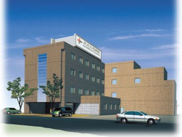 施設の外観 外観   落ち着いた色合いの建物で、上部に看板が見えます。駐車スペースもあり、来訪しやすい印象です。