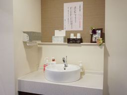 清潔な洗面台の一角