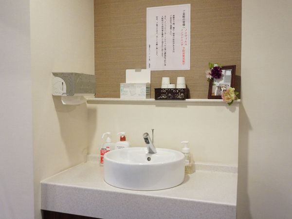 清潔な洗面台の一角