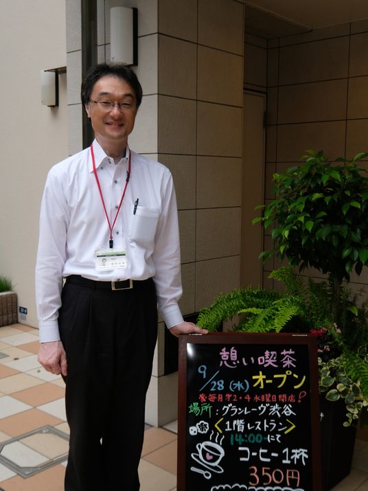 スタッフと案内ボード