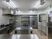 サムネイル 施設の写真 ステンレス製の本格的な調理器具がそろった広い厨房は整理整頓が行き届き、清潔感がある。