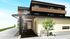 緑に囲まれた建物の外観