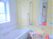 サムネイル 施設の写真 手すりとシャワーチェアがある介護用浴室の様子。小さな浴室の写真