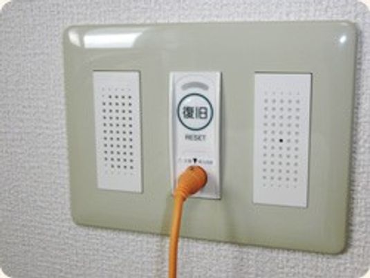 復旧ボタンの壁面装置  