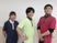 スタッフ3人が並ぶ室内  