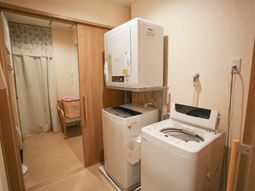洗濯機と物干しスペース