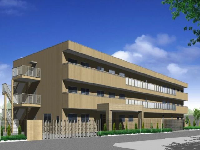 3階建ての外観 外観   落ち着いた色合いの3階建て建物です。外階段と植栽が見え、明るく整った印象です。