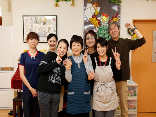 笑顔のスタッフグループ