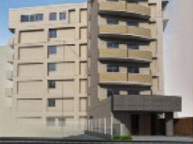 多階層の建物の正面 施設外観 シンプルでモダンなデザインが特長の建物です。周囲の景色と調和しながらも、その存在感を放っています。