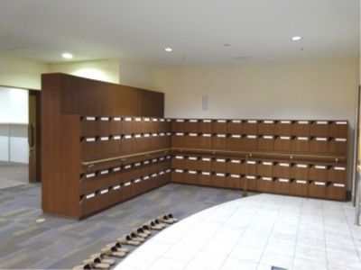 整理された靴箱があるエントランス