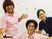 職員3人が笑顔の職場風景  