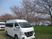 送迎車と桜の外観  