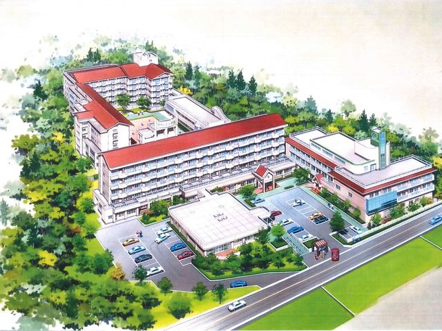 広々とした建物外観 外観 緑に囲まれた大規模な建物で、快適な環境を提供しています。周囲には十分な駐車スペースもあります。