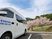送迎車と桜の外観  