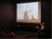 サムネイル 施設の写真 施設内に用意されているシアタールームでは、大画面で映画を見ることが可能となっている。座り心地の良いソファが置かれている。
