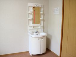 清潔な洗面台の一角
