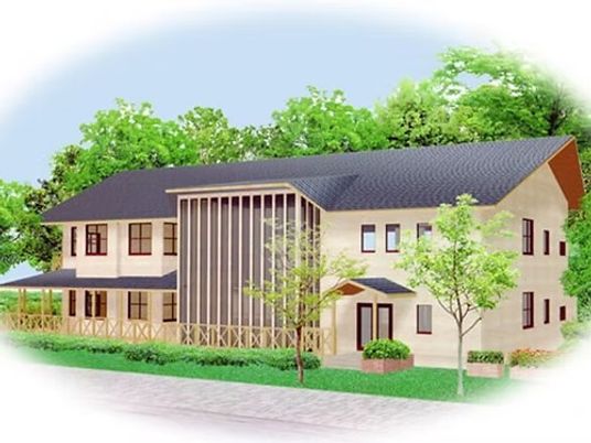 緑に囲まれた建物外観  