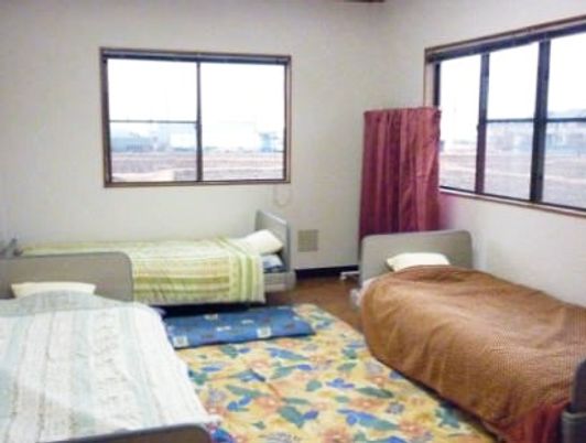 3つのベッドがある部屋