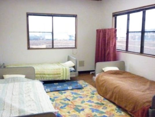 3つのベッドがある部屋