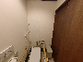 手すり付きトイレの室内