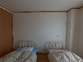 ベッドのある明るい部屋
