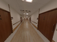 施設内の廊下と部屋の扉