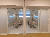 介護用具とベッドの部屋