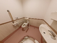手すり付きトイレのある部屋